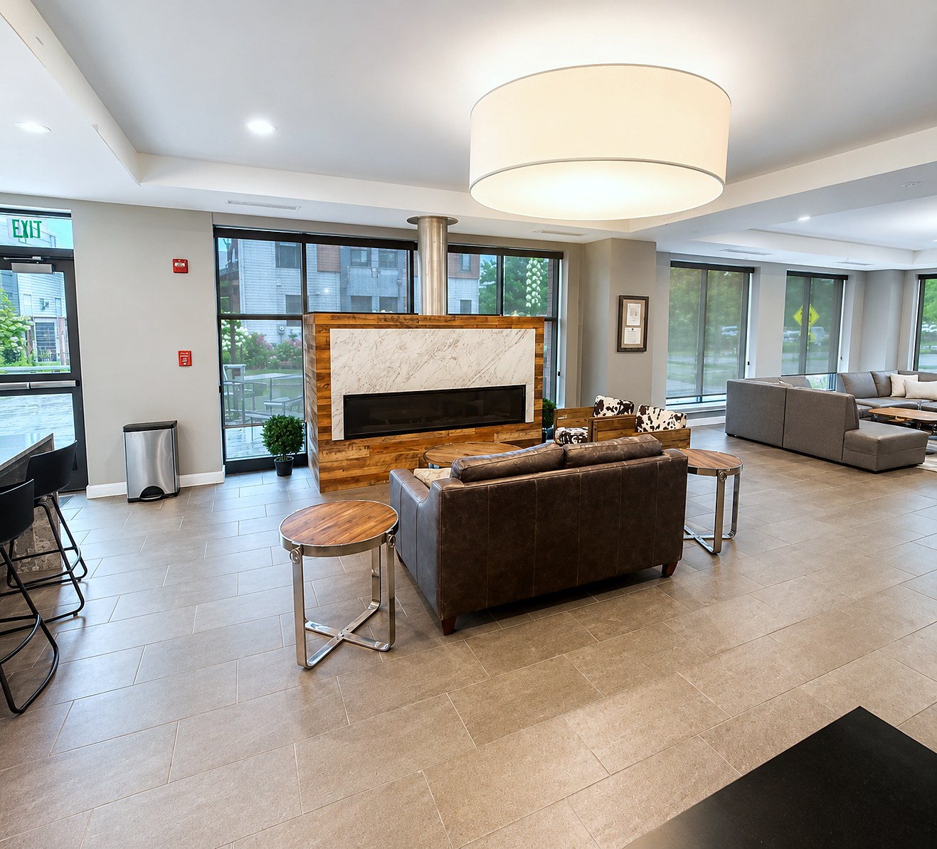 The community room at Charlotte Square, looking across to the fireplace and the kitchen bar