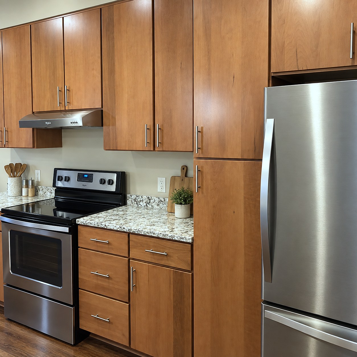 The range wall of a kitchen at Charlotte Square, with a full-height pantry beside the refrigerator